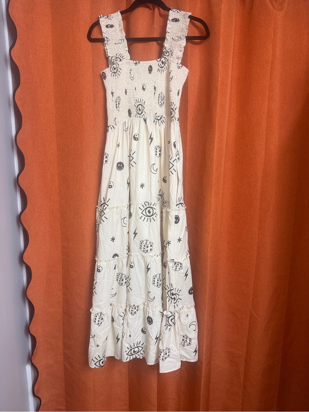 Dressed in LALA ‘What’s your sign’ zodiac dress